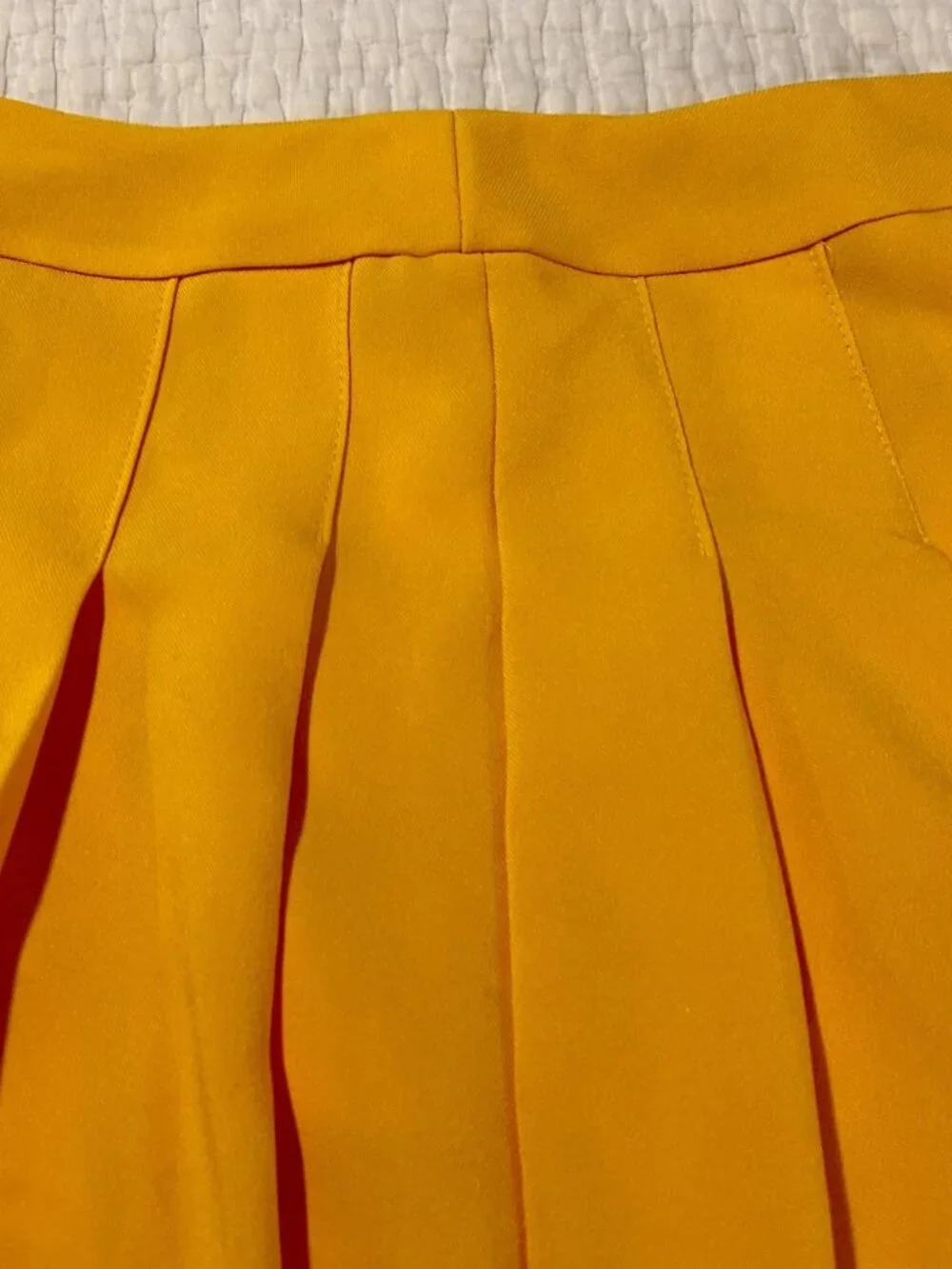 Source Unknown pleated yellow